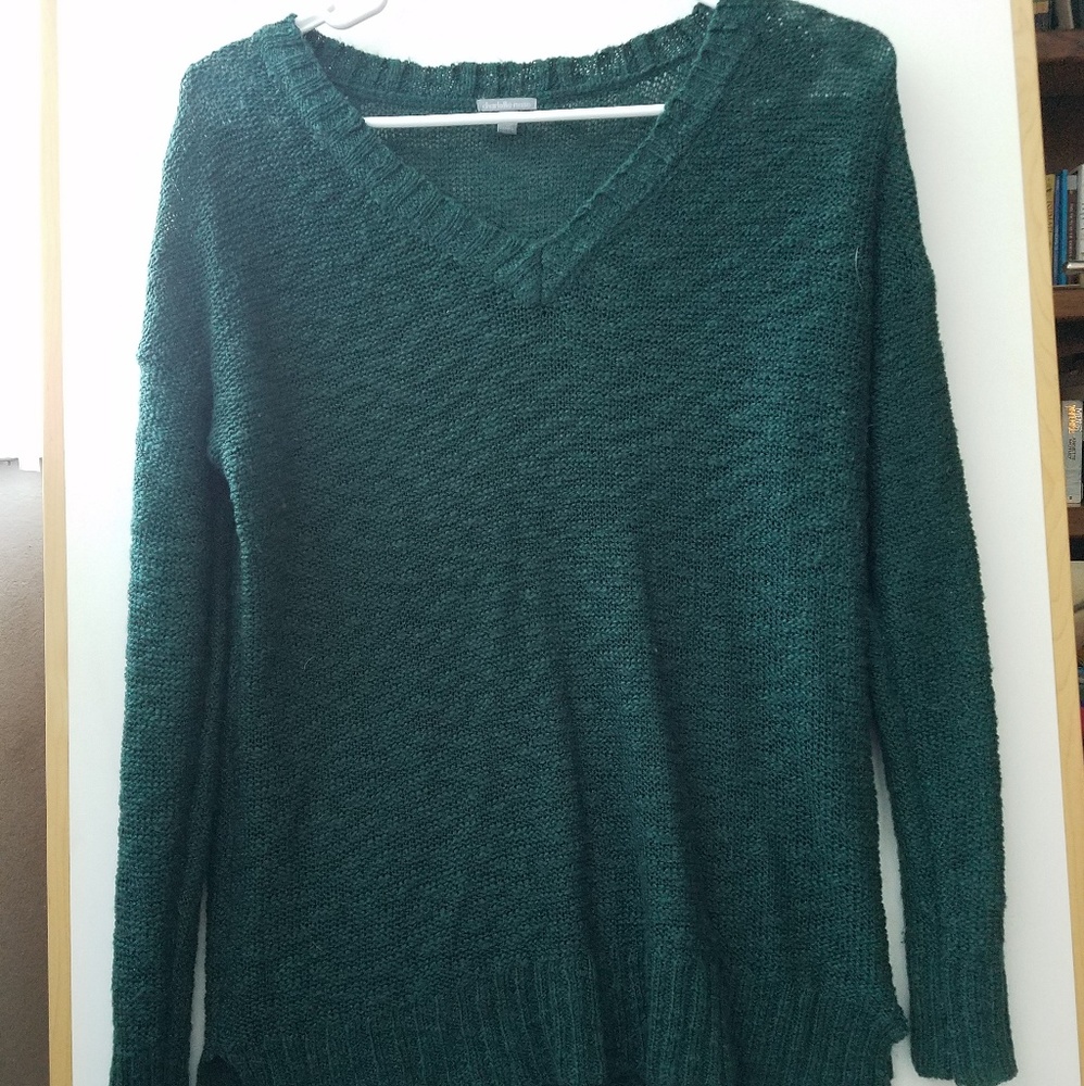 Green V-neck sweater